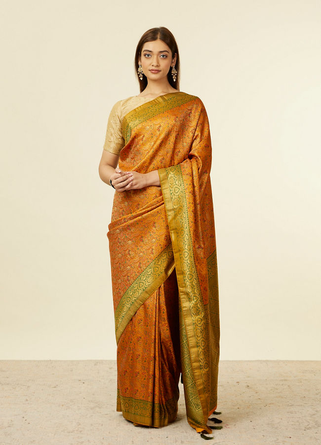 alt message - Mohey Women Mustard Yellow Bel Buti Patterned Saree with Trim Latkans image number 0